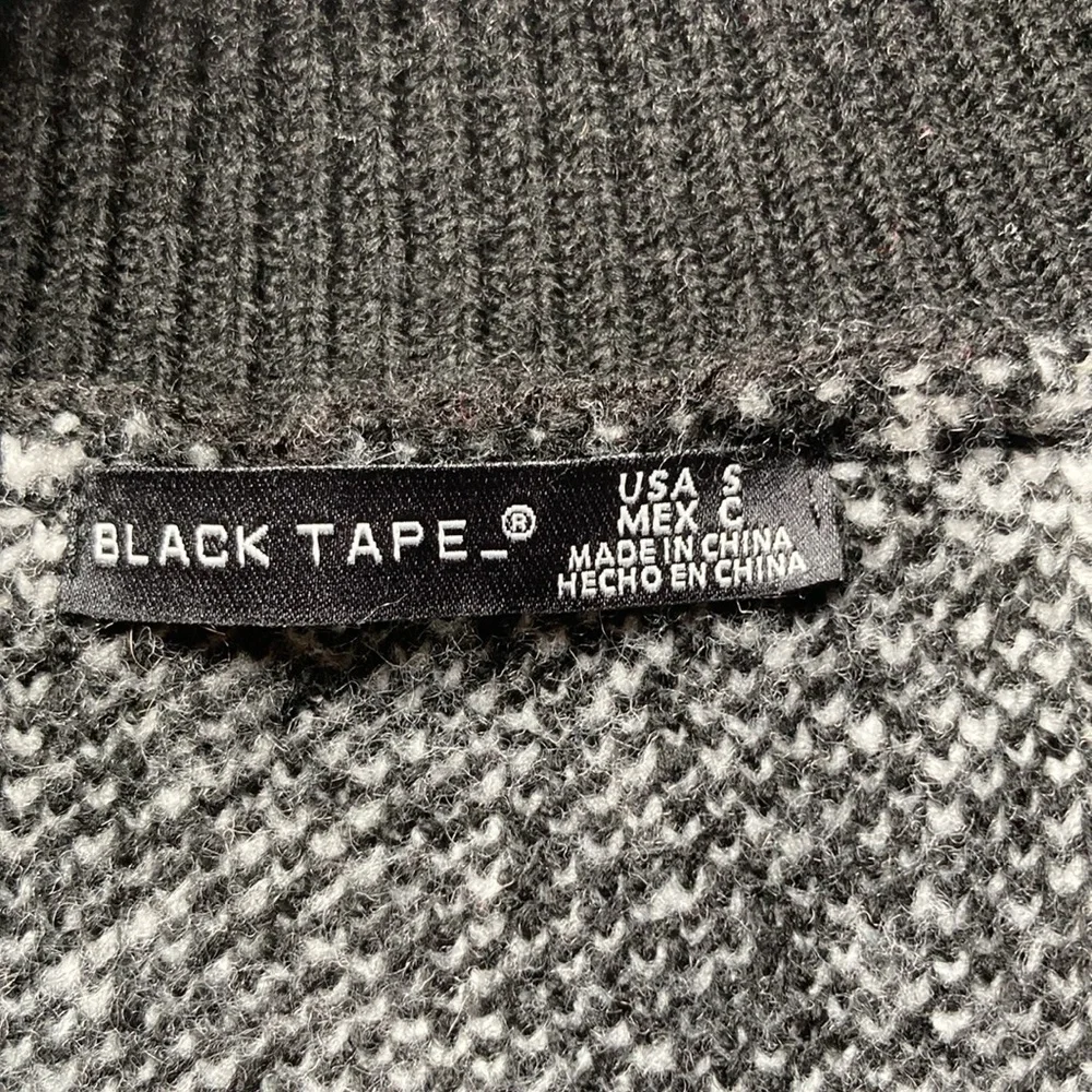 Black Tape NWT size small Black and white sweater. Excellent condition.